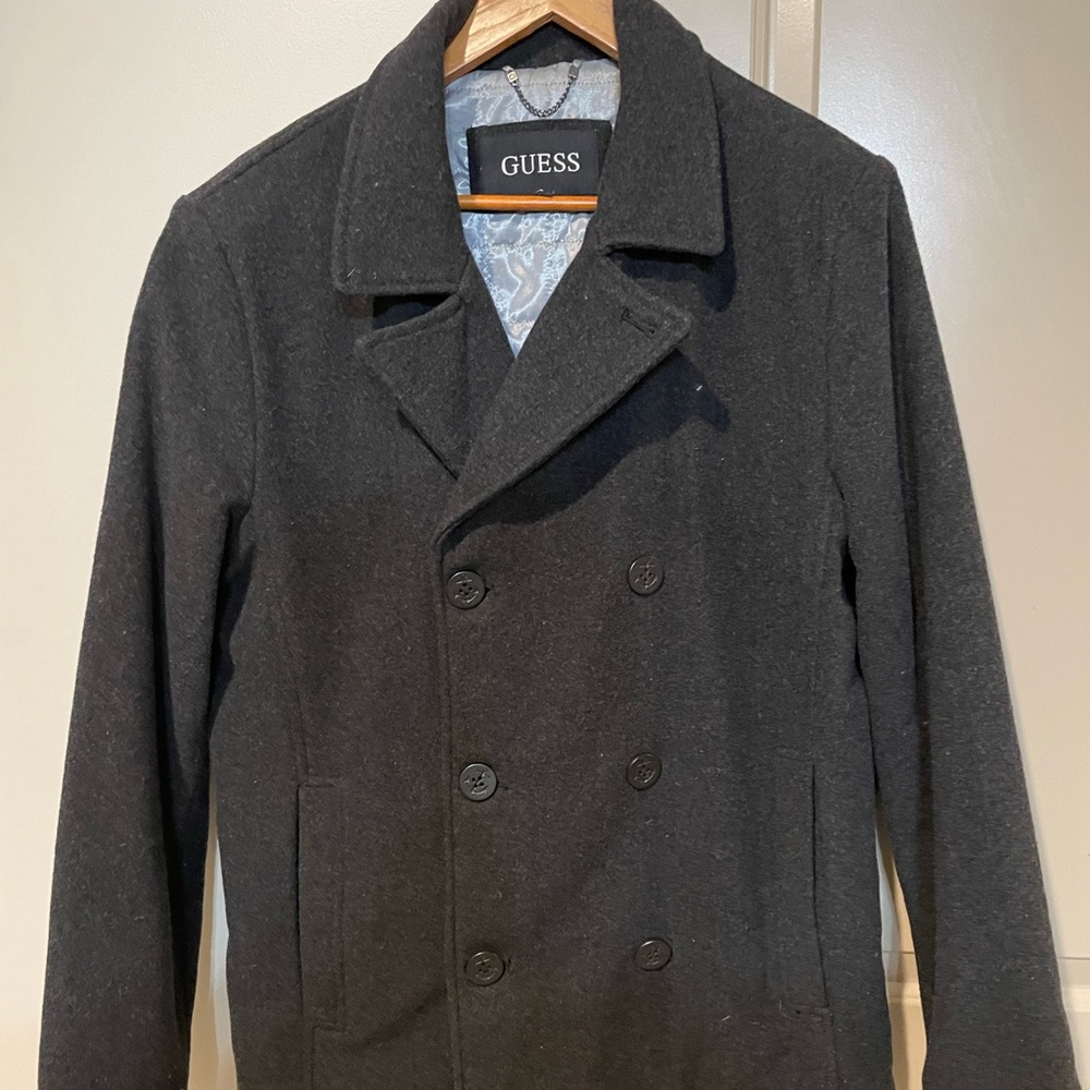 Guess women coat. Never used. Medium very comfy and spacious can fit a large.